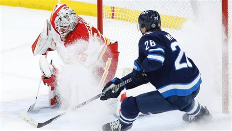 Flames beat Jets 3-1 to keep playoff hopes alive